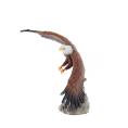 Colored eagle appearing to fly over a tree trunk, 39 cm full-body alabaster statue, Decorative