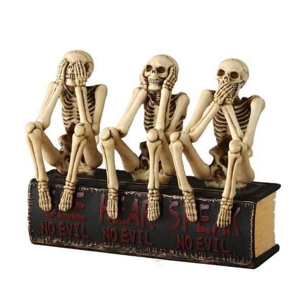 THREE WISE SKELETONS SITTING ON BOOK